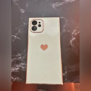 Teal phone case with gold highlights for an iPhone 12